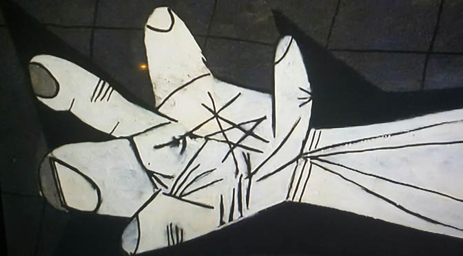 Guerra Picasso mano